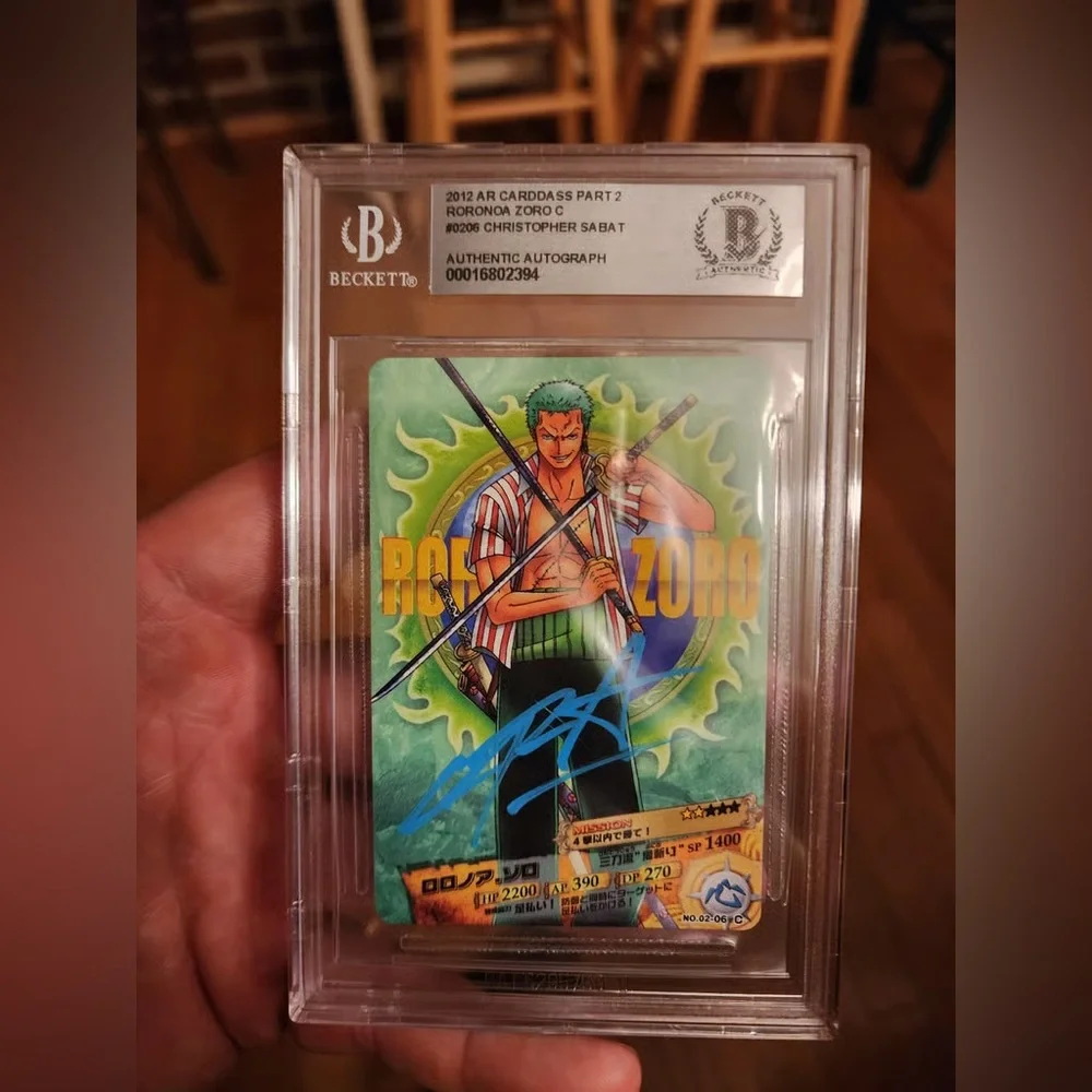 Graded Roronoa Zoro Autograph Trading Card - Green